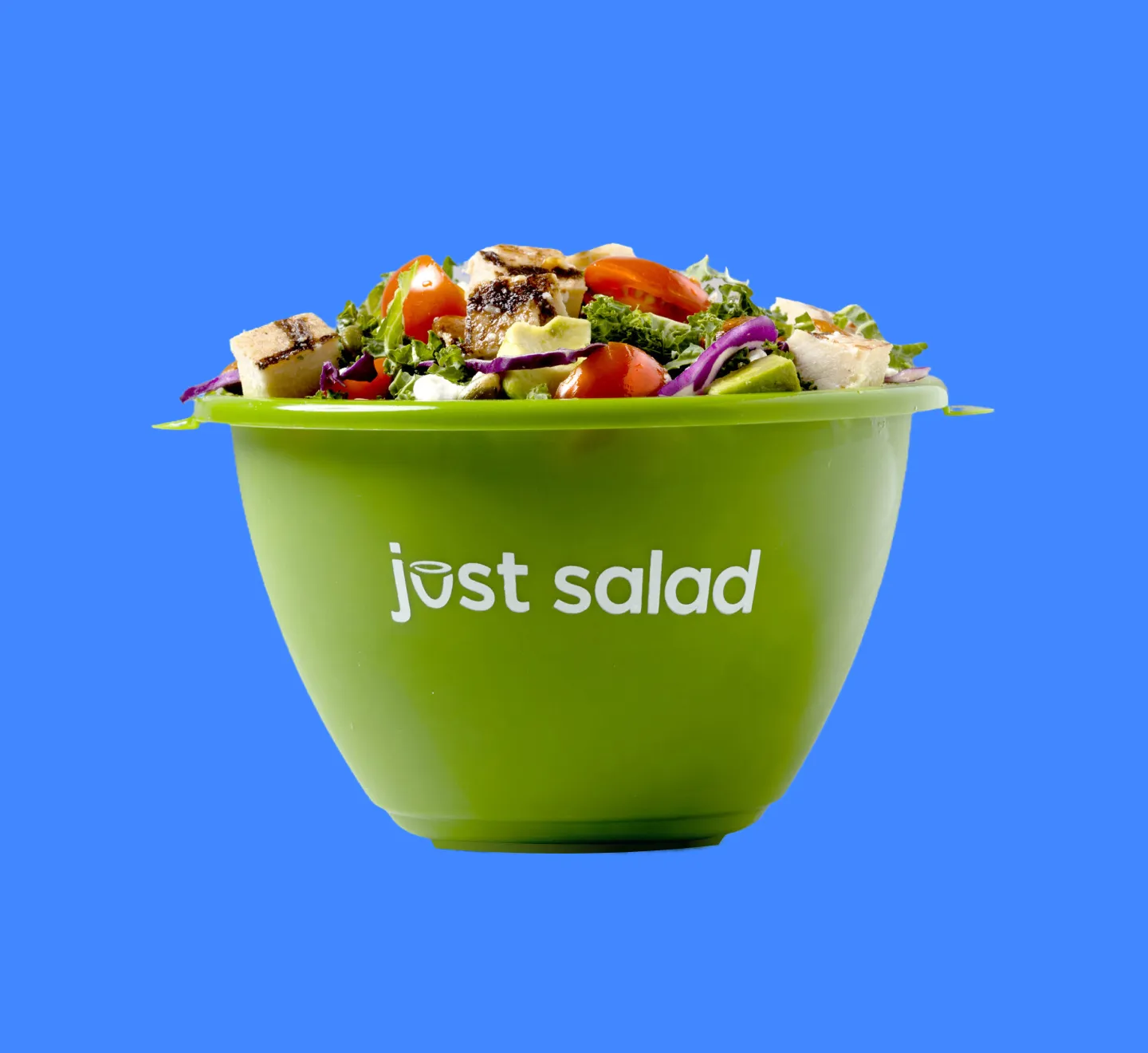 A Just Salad BringBack bowl on a solid background