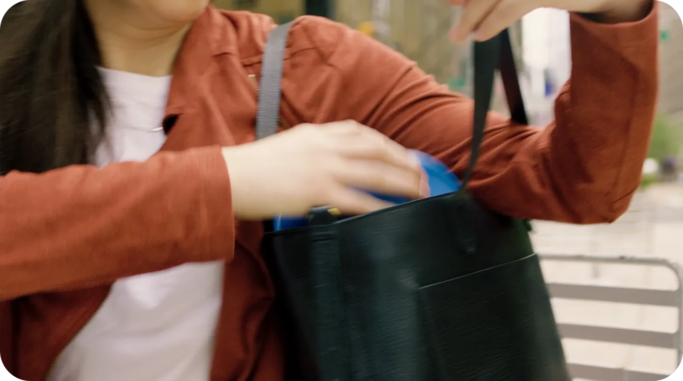 A person putting a MyBowl in their bag